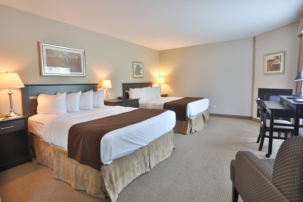 Hotel Le Versailles Saint-Sauveur-des-Monts Quarto foto
